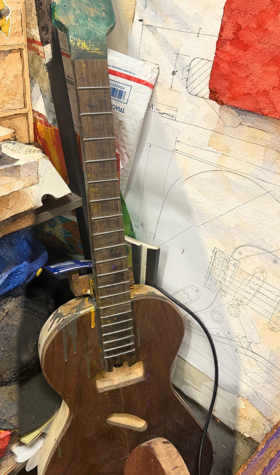 Empusa, workshop photo of a real guitar, painted ground.